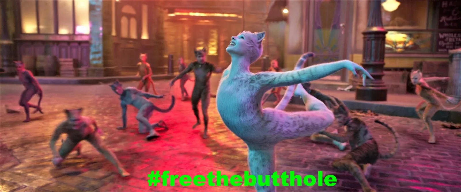 Still from Cats (2019) with caption "#freethebuttholes"